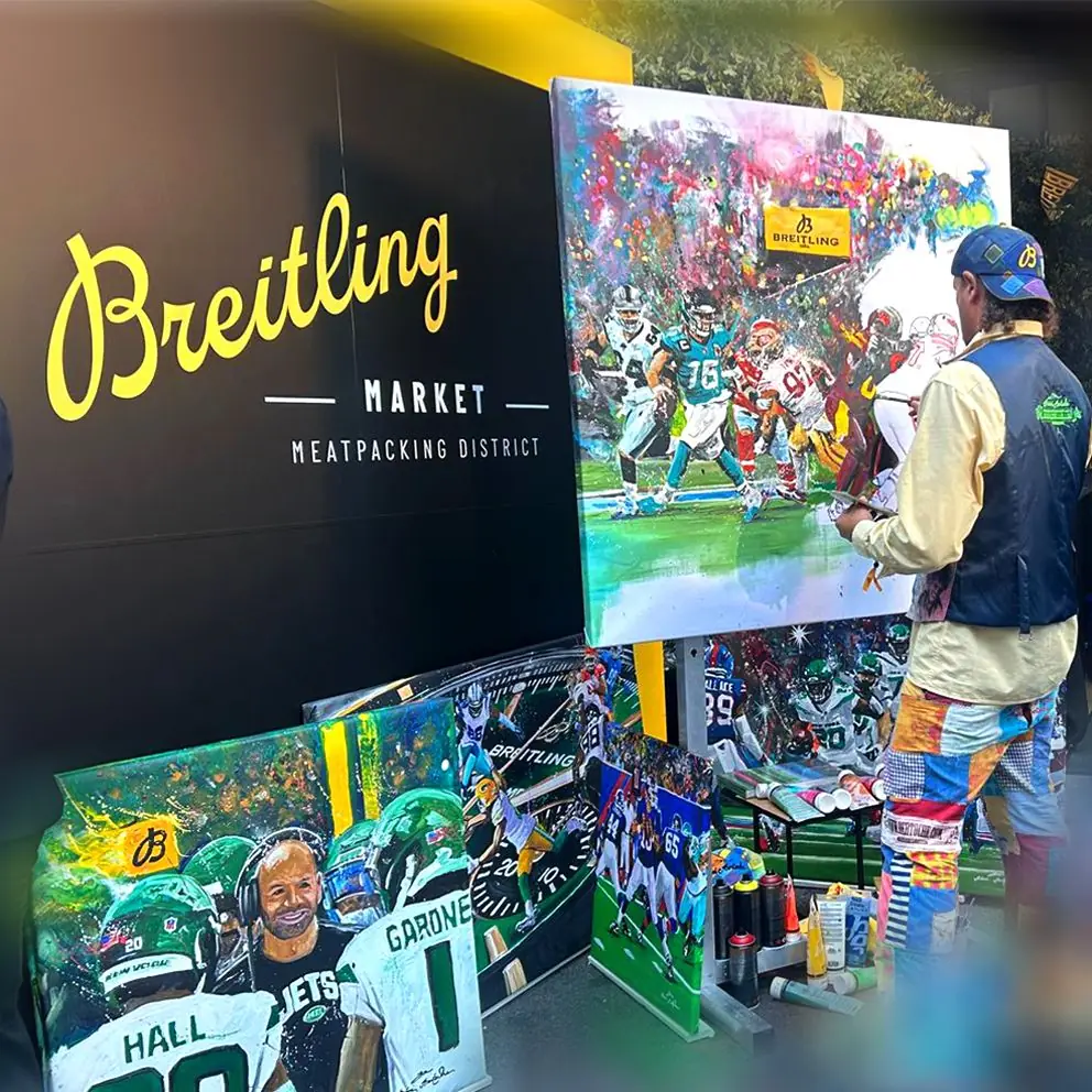 Rémi Bertoche en live painting lors d’un événement Breitling